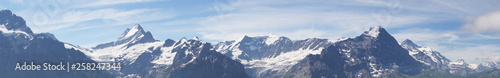 Alpine peaks of Grindelwald and Jungfrau. Landskape background of Bernese highland. Alps, tourism, journey, hiking concept. © Acronym