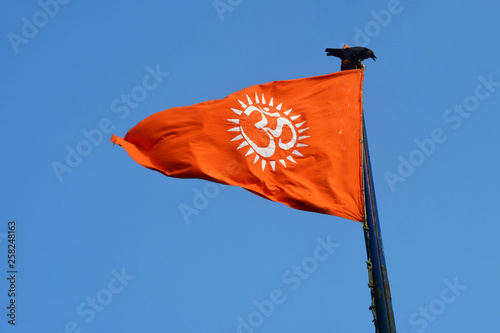 Red flag with Ohm sign photo