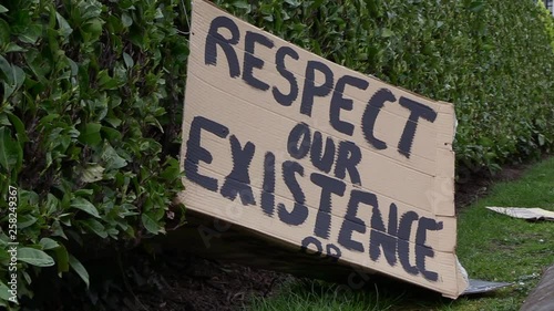 a cardboard protest sign left behind, at a march against global warming. the occupy for climate event in Brussels, Place du Trône on march the 25th 2019