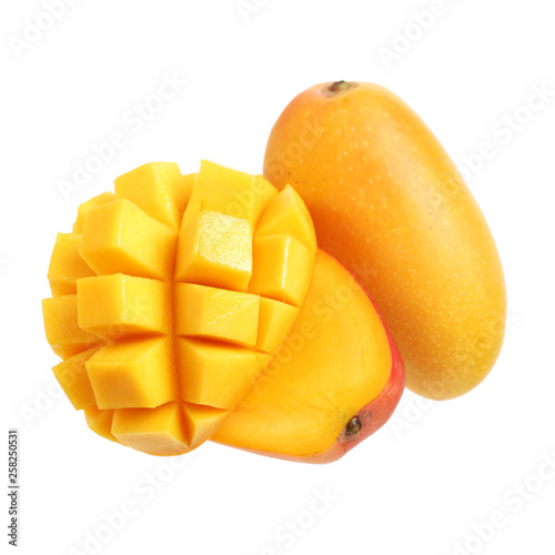 Mango slice cut to cubes close-up isolated on white background