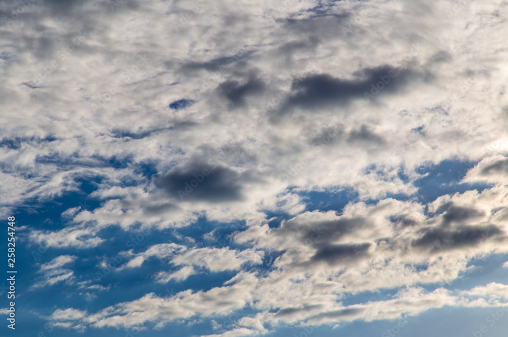 Obraz premium Clouds against the blue sky as a background