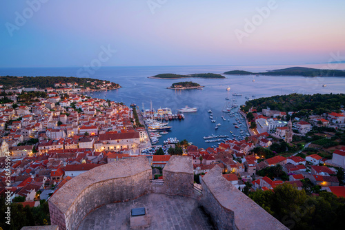 Panoramic view of Hvar Town in Croatia. Hvar Town is the famous town for summer beach vacation on Hvar Island in Dalmatia, Croaita. photo