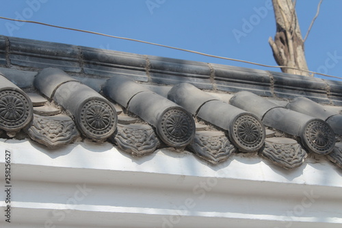 Traditional Chinese Architecture Roof Tiles and Tile Windows