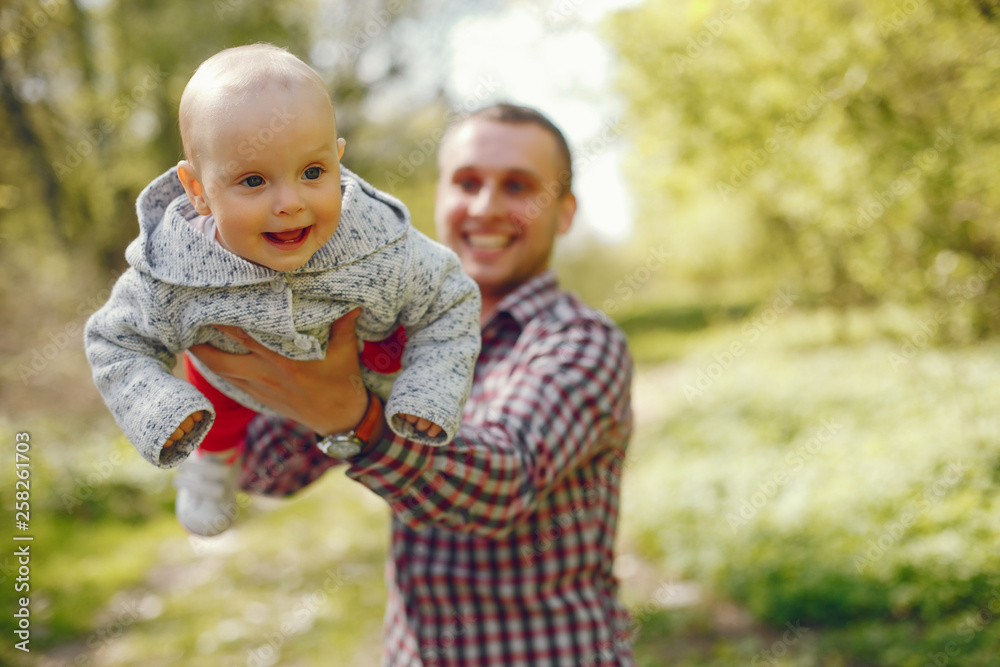 Fototapeta premium Father with son in a park