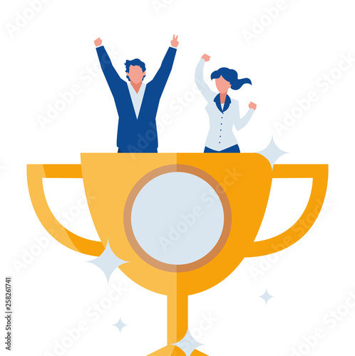 elegant business couple celebrating in trophy cup