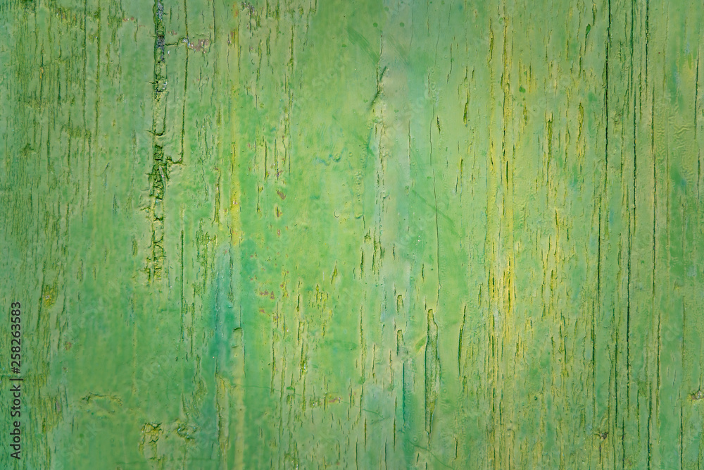 Fototapeta premium Green vintage wood background texture with knots, old paint and nail holes