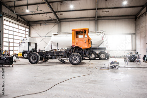 Paint shop and lighting in the large trucks and passenger cars are painted and also repaired