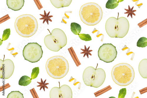 Seamless pattern Slice of green Apple  cucumber and lemon. Lemon peel chips cinnamon and anise isolated on white.