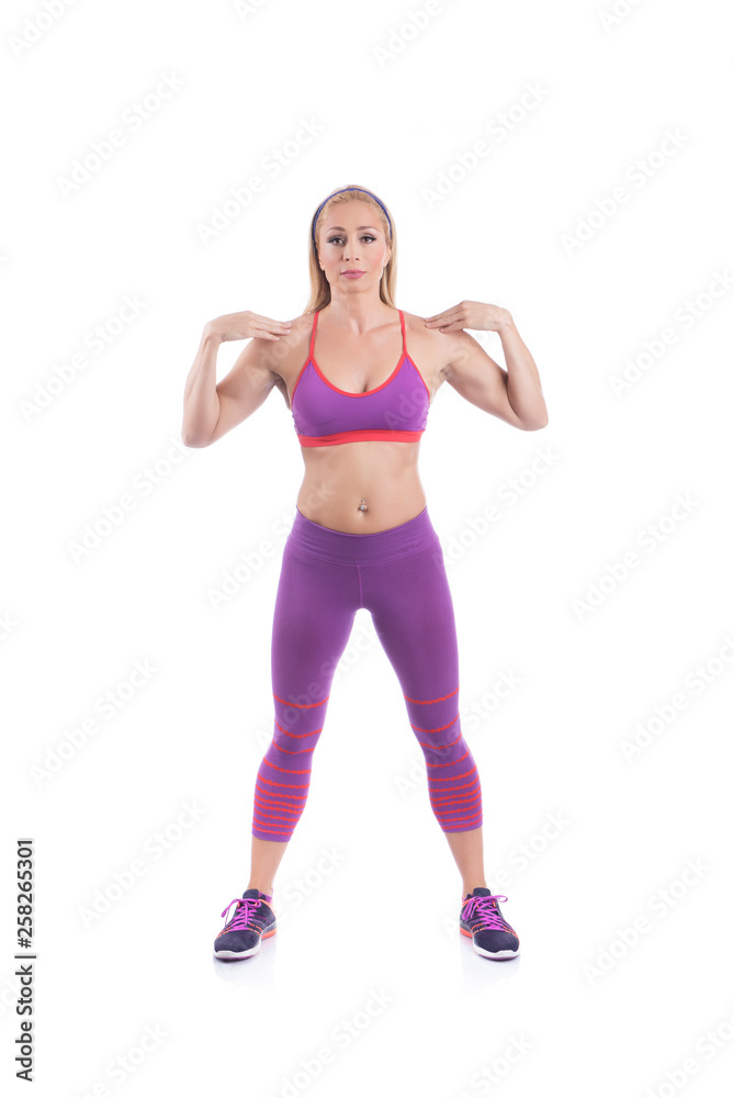 Beautiful young pregnant woman doing exercises on a white background. Early pregnancy. Beautiful young pregnant woman doing exercises on a white background. Early pregnancy.
