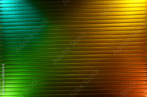 Bright intersecting rays of light of different colors and lines