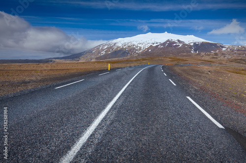 Empty road in west Iceland at sunny day