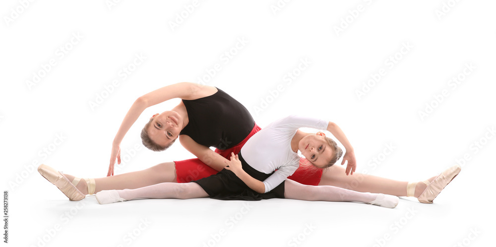 Little ballerina training with coach against white background Little ballerina training with coach against white background