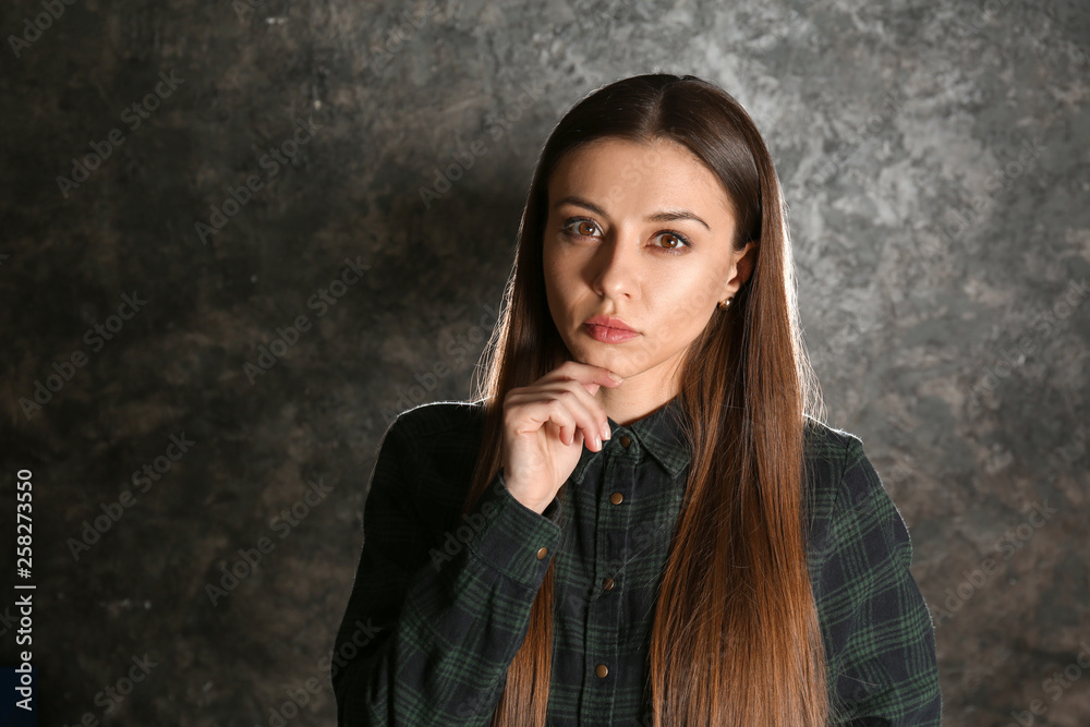 Portrait of stylish woman on grunge background Portrait of stylish woman on grunge background