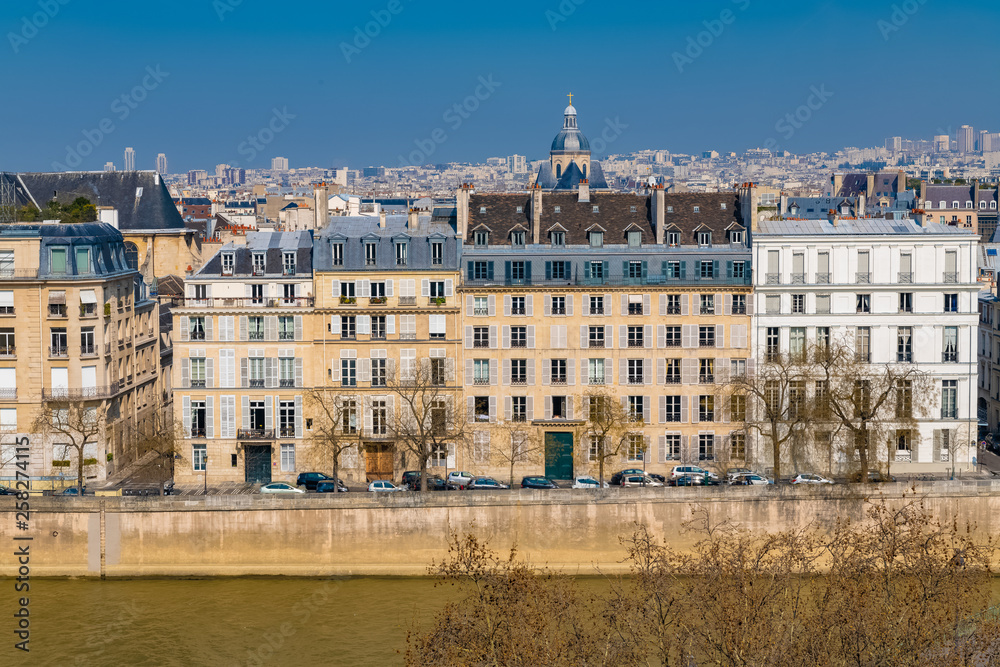 Paris, view of ile Saint-Louis, panorama of the roofs and houses with view on the Seine
