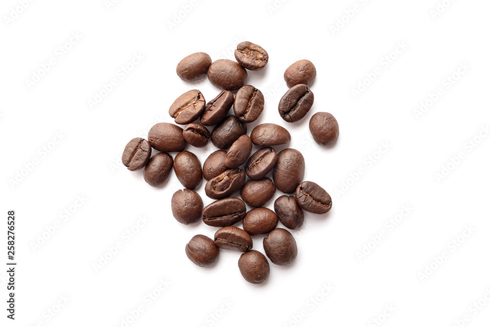 Roasted coffee beans isolated on white background. Close-up. Roasted coffee beans isolated on white background. Close-up.