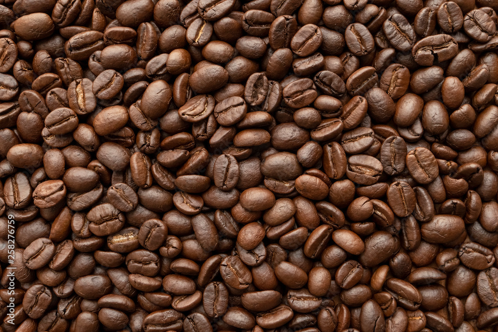 Roasted of coffee beans for background. Close-up. Roasted of coffee beans for background. Close-up.