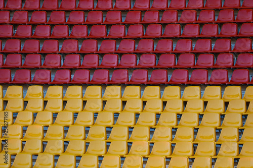 Empty seats in the stadium  red and yellow seats