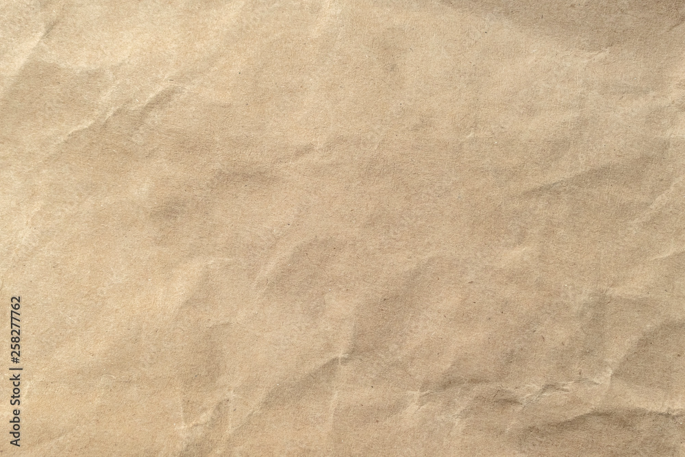Brown crumpled paper texture background. Brown crumpled paper texture background.