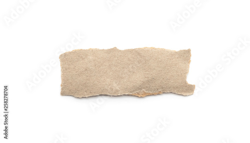 Recycled paper craft stick on a white background. Brown paper torn or ripped pieces of paper isolated on white.