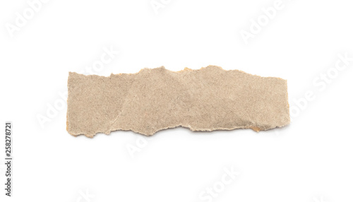 Recycled paper craft stick on a white background. Brown paper torn or ripped pieces of paper isolated on white.