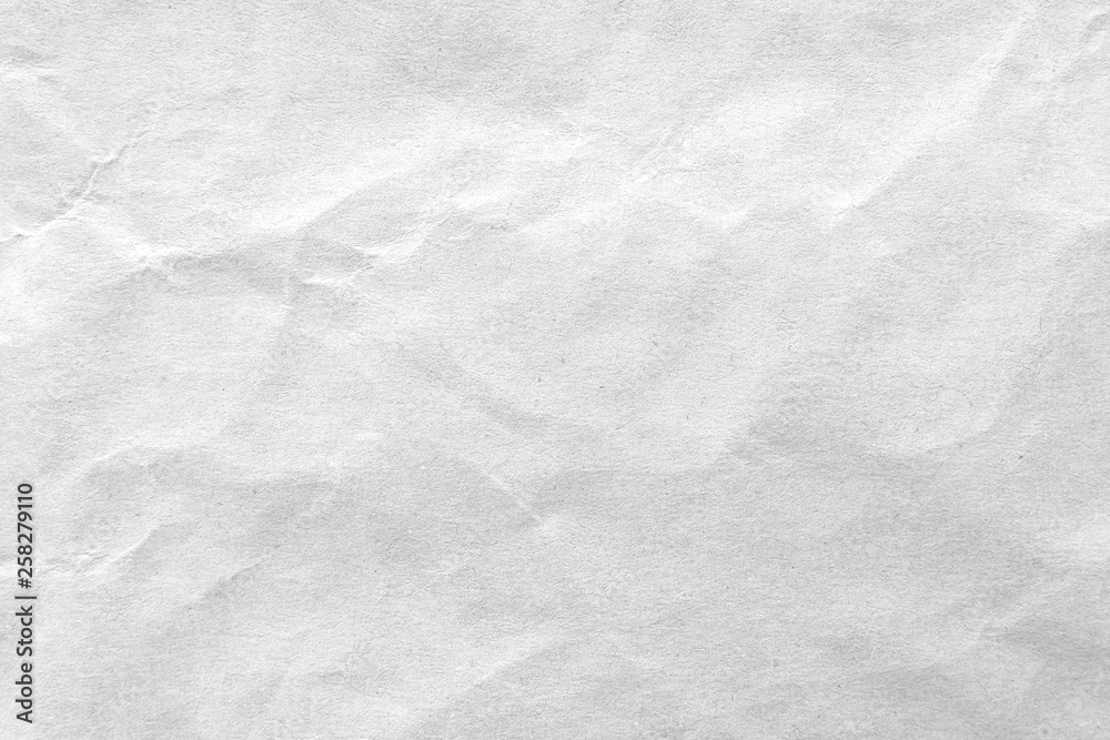 White crumpled paper texture background. Close-up. White crumpled paper texture background. Close-up.