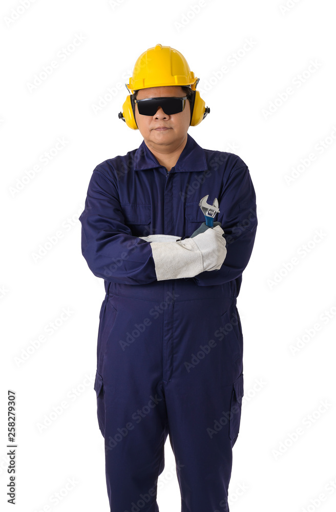 portrait of a worker in Mechanic Jumpsuit is holding a wrench isolated on white background