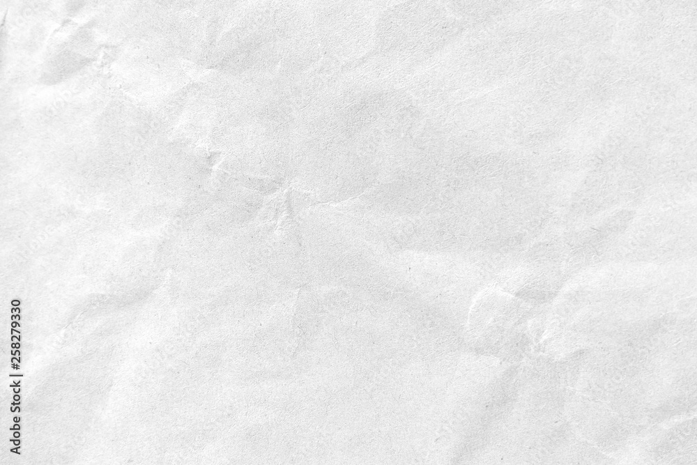 White crumpled paper texture background. Close-up. White crumpled paper texture background. Close-up.