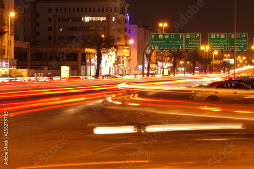 Busy traffic at night, on the famous Tahlia Street In Jeddah, Saudi Arabia photo