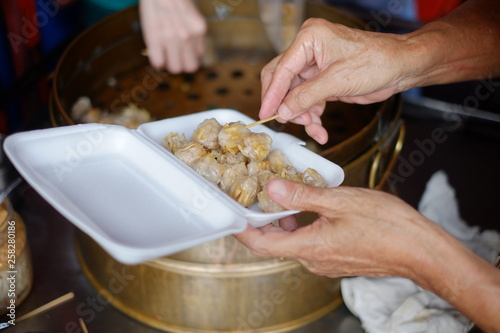Traditional chinese food dumpling  steam in bamboo basket