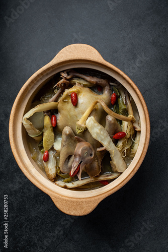 Chinese health soup Jianhua Yuzhu stewed pigeon soup photo