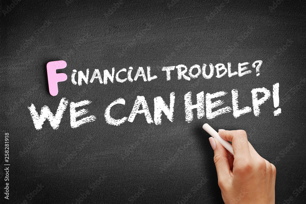 Financial Trouble? We can help! text on blackboard, business concept background Financial Trouble? We can help! text on blackboard, business concept background