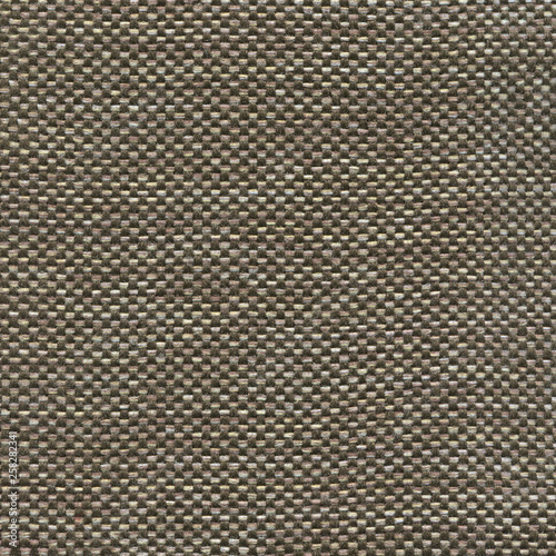 Brown textile textured background. Vintage fashion background for designers and composing collages. Luxury textured genuine fabric of high and natural quality.