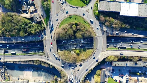 hyperlapse, timelapse of a large section of commuter motorway, highway, during busy congestion, traffic, rush hour. 10 way street intersection circle roundabout route highway called the A50, A500 photo