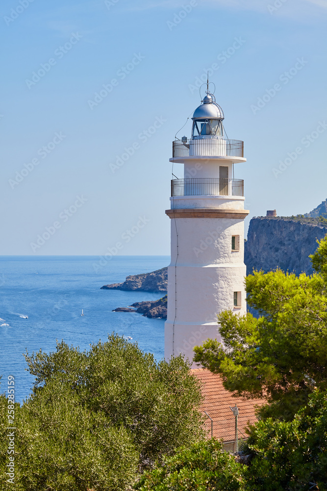 Cap Gros lighthouse located on a cliff in the vicinity of Port Soller, Mallorca, Spain.