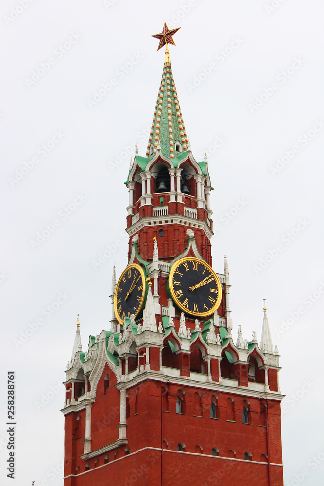 Moscow Kremlin, Red Square. clock tower decorated by the red ruby star on the top. White background. Popular Russian sights, symbol Moscow Kremlin, Red Square. clock tower decorated by the red ruby star on the top. White background. Popular Russian sights, symbol
