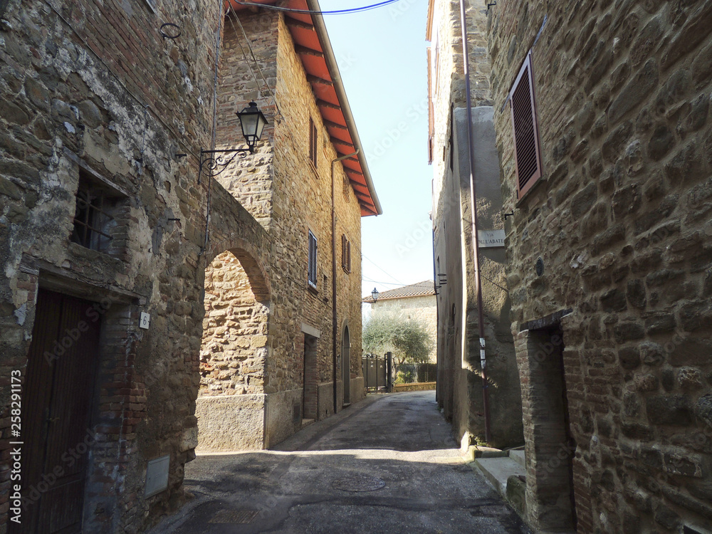 Typical alley of the small medieval village of Civitella Benazzone near Perugia, Umbria, Italy.