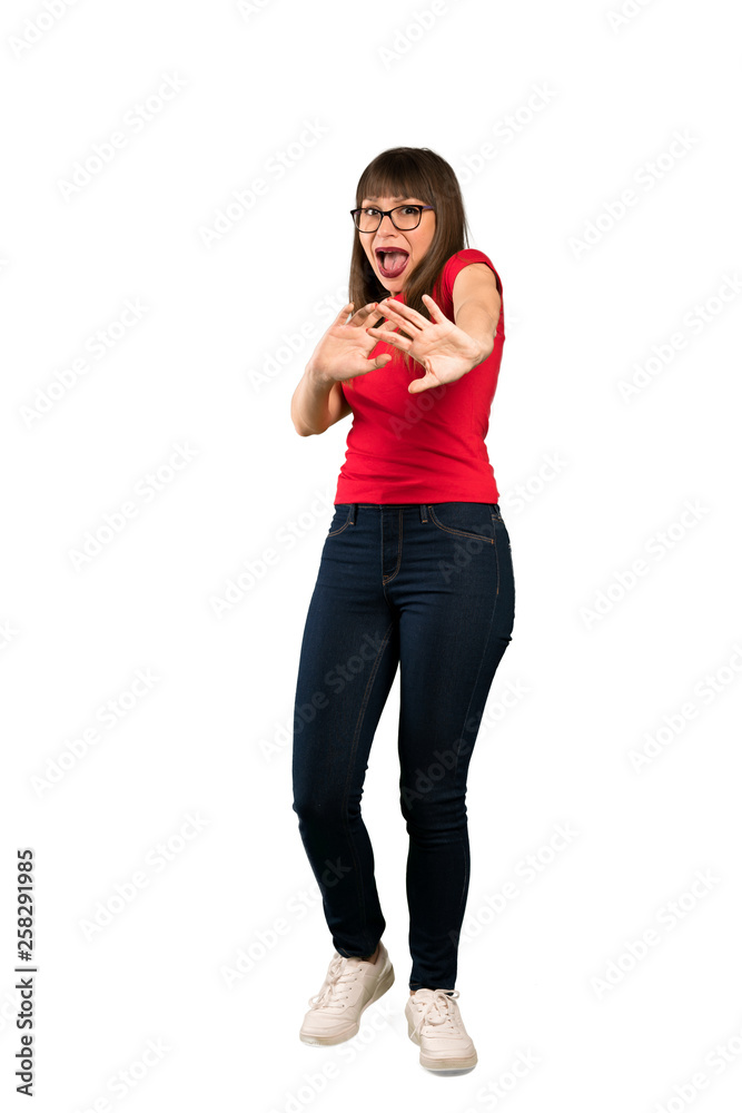 Full-length shot of Woman with glasses nervous and scared stretching hands to the front Full-length shot of Woman with glasses nervous and scared stretching hands to the front