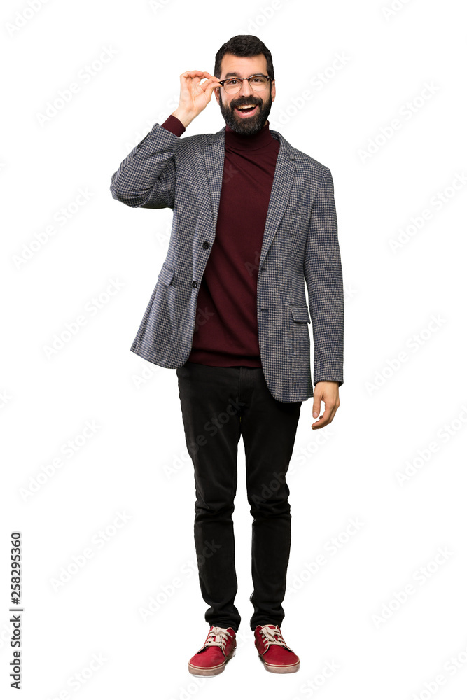 Handsome man with glasses with glasses and surprised over isolated white background Handsome man with glasses with glasses and surprised over isolated white background