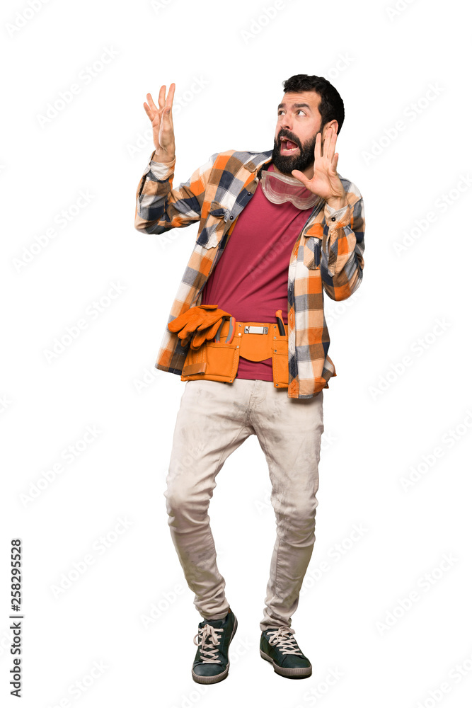 Craftsmen man nervous and scared over isolated white background Craftsmen man nervous and scared over isolated white background