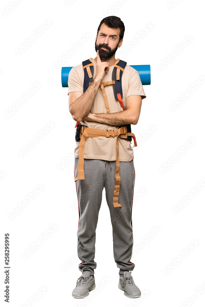 Hiker man Looking front over isolated white background Hiker man Looking front over isolated white background