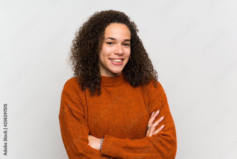 Dominican woman over isolated white wall laughing Dominican woman over isolated white wall laughing