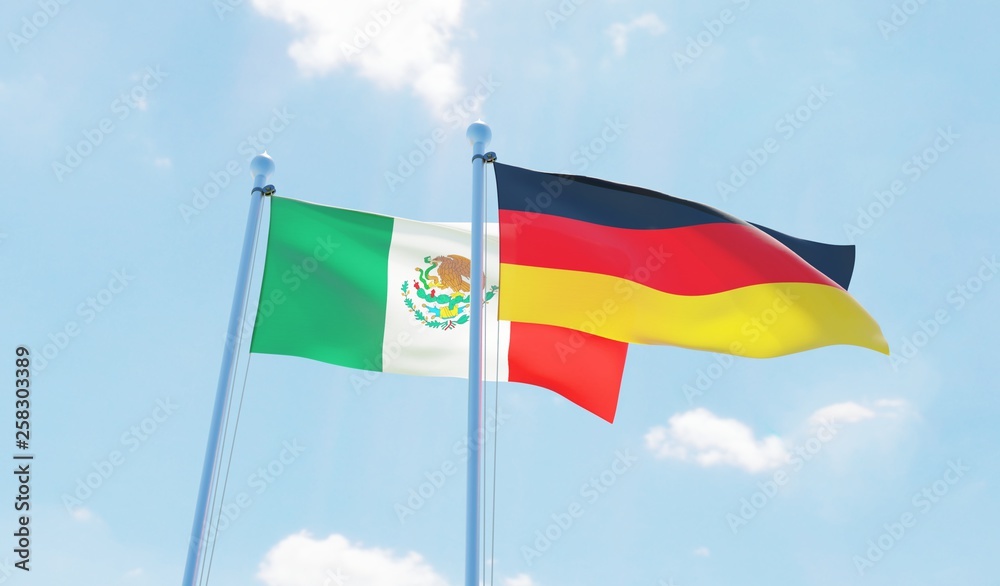 Germany and Mexico, two flags waving against blue sky. 3d image Germany and Mexico, two flags waving against blue sky. 3d image