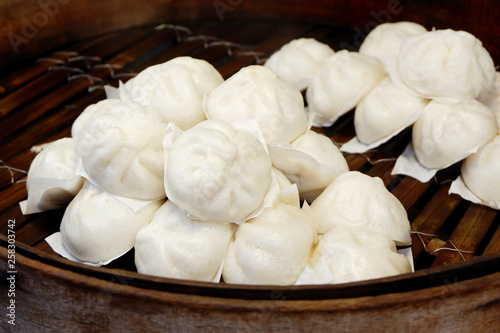 Bild auf Leinwand Delicious Chinese Pork Buns in the Bamboo Steamer