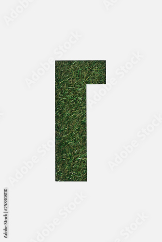 cut out cyrillic letter with fresh green grass on background isolated on white