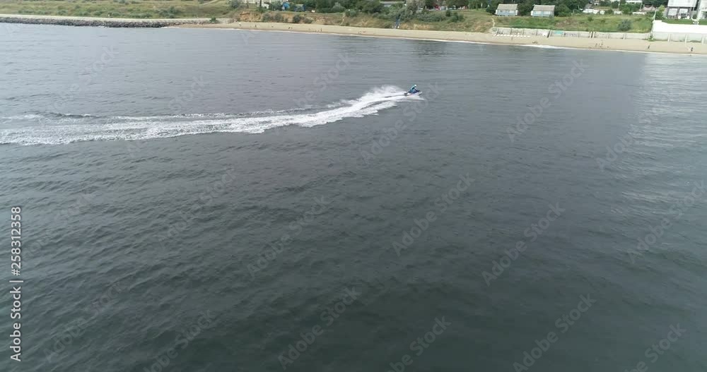 relaxing on the beach, riding a water bike relaxing on the beach, riding a water bike
