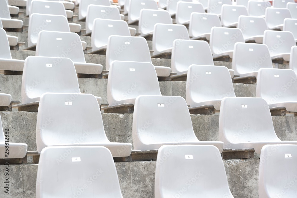 Naklejka premium Empty white stadium stand rows with sunlight