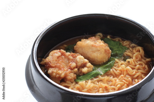 Korean food, fried chicken in hot pot ramen noodles
