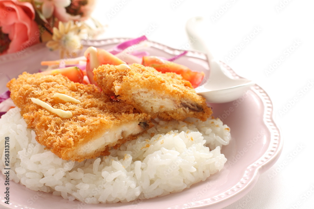Japanese fried fish on rice served with salad Japanese fried fish on rice served with salad