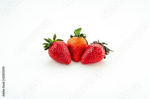  fresh strawberries. white background. crop 2019. one or several