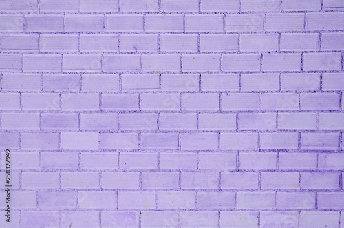 Purple brick wall background or texture photo